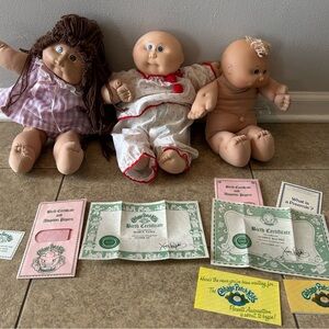 Lot Of 3 Cabbage Patch Dolls And 2 Sets Of Adoption Papers